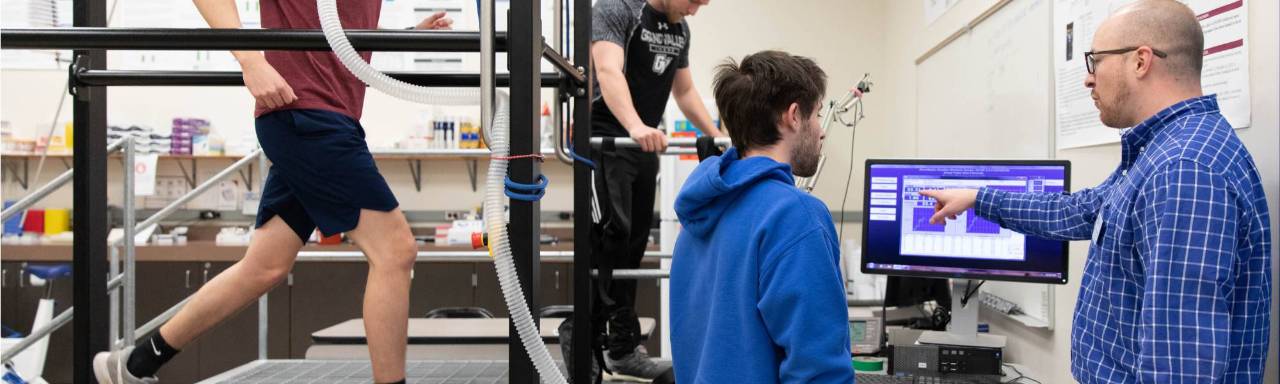 faculty and students engaged in exercise testing